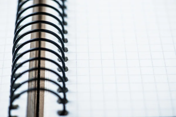 Cuaderno en una mesa de madera — Foto de Stock