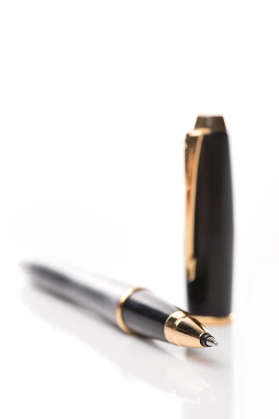 Black old fashioned pen on the white background, isolated. — Stock Photo, Image