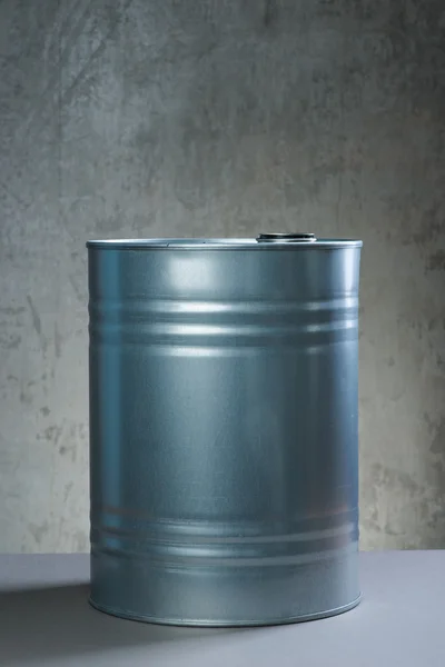 Chemicals drum over the concrete wall background — Stock Photo, Image