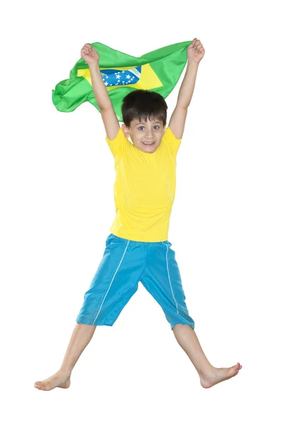 Brazilian Boy, jumping, yellow and blue — Stock Photo, Image