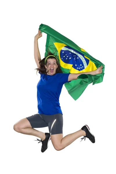 Brazilian female fan, jumping with flag — Stock Photo, Image