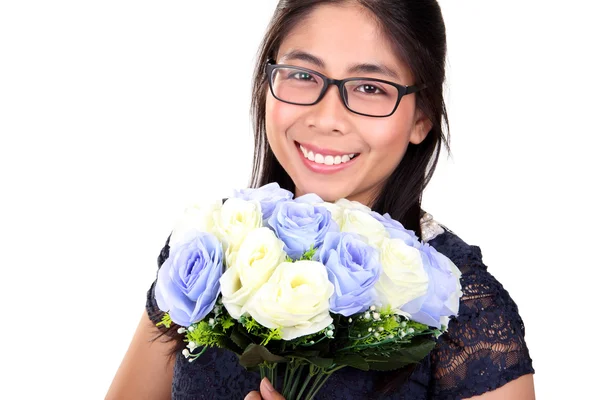 Smiling woman with white and blue roses — Stock Photo, Image