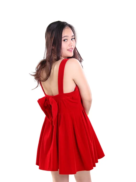 Krásná žena a její roztomilé červené šaty — Stock fotografie