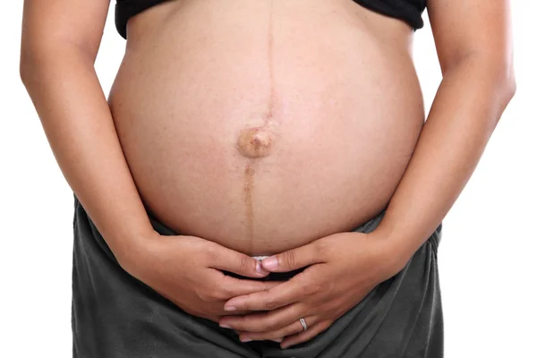 Embarazada vientre de cerca — Foto de Stock