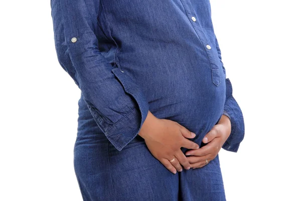 Vientre embarazada vestida de azul — Foto de Stock