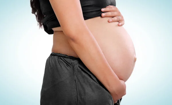 Side profiel van zwangere vrouw buik — Stockfoto