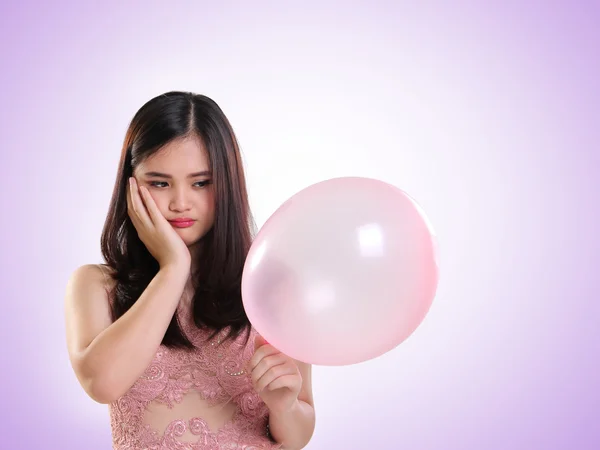 Sad girl and a balloon — Stock Photo, Image