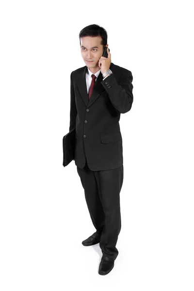 Young entrepreneur on phone — Stock Photo, Image