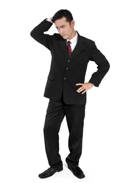 Awkward businessman standing — Stock Photo, Image