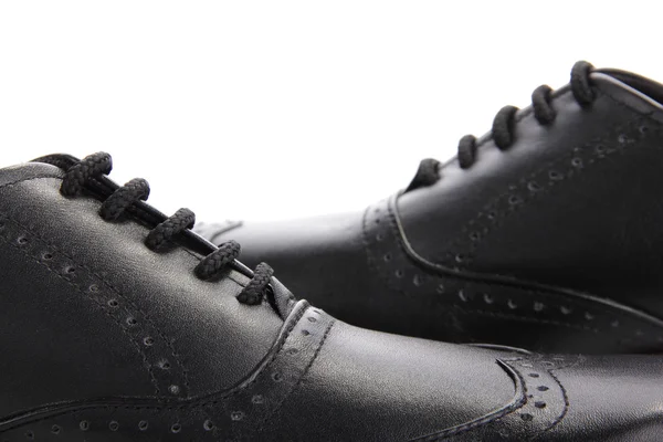 Çarpı işareti siyah deri ayakkabı — Stok fotoğraf