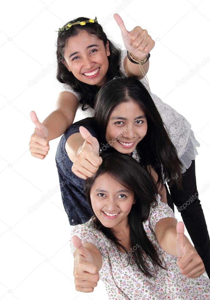 3 happy girls thumbs up