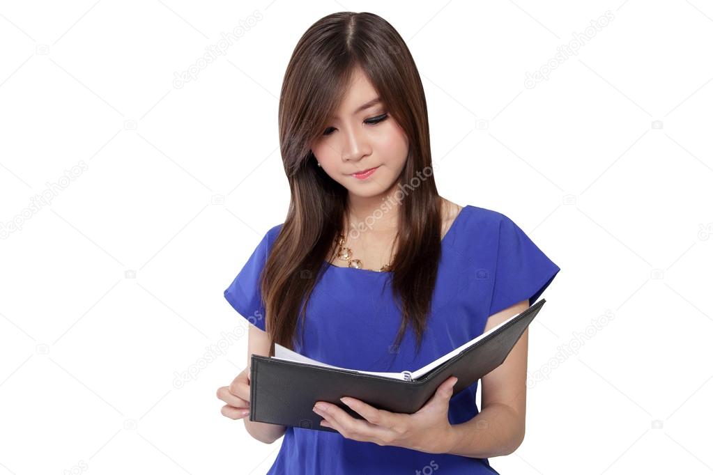 Asian girl reading a book