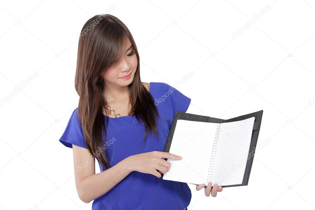 Asian woman point her finger to a book