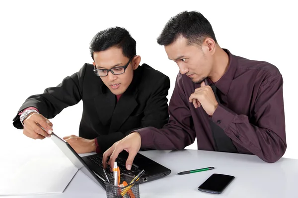 Business partners working with laptop — Stock Photo, Image