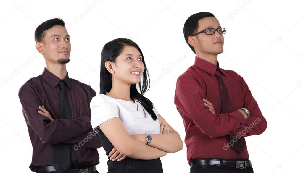 Asian business team staring up