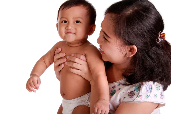 Vackert leende för baby och mamma — Stockfoto