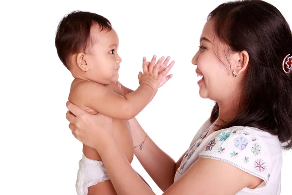 Bebê e mamãe brincam juntos — Fotografia de Stock