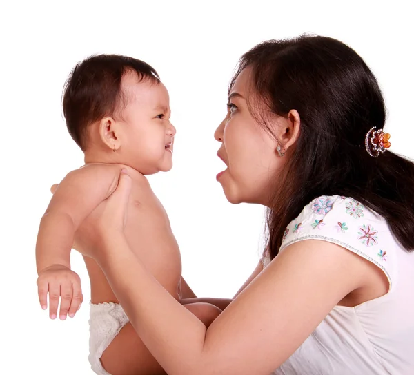 Bebê e mãe luta — Fotografia de Stock