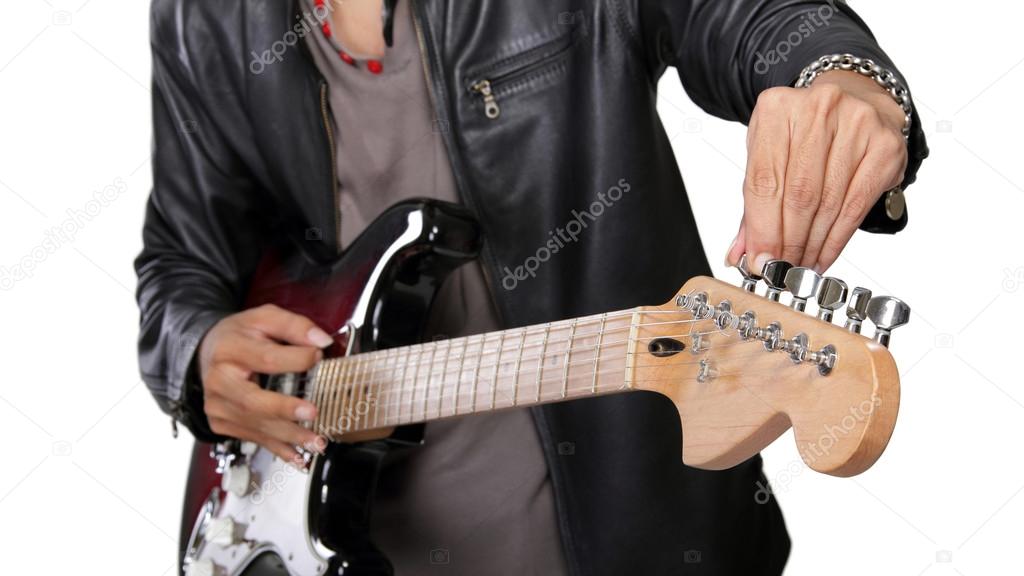 Closeup of guitar tuning