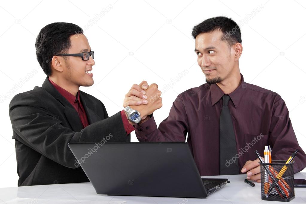 Powerful handshake of business people