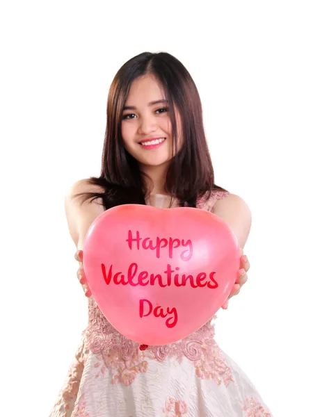 Lovely girl show Valentines balloon isolated — Stock Photo, Image