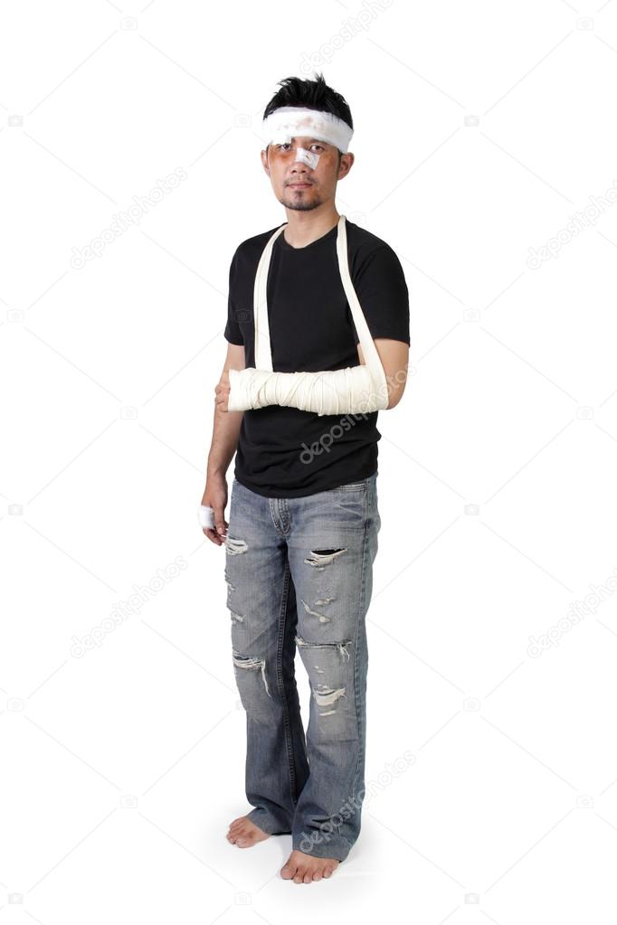 Full length of bandaged man isolated