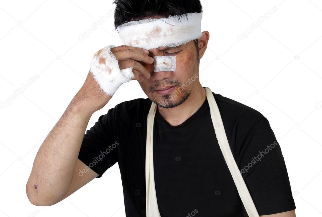 Man in bandage feels painful isolated