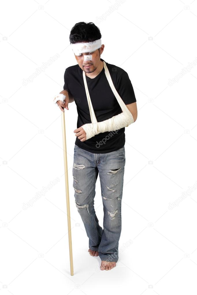 Injured man walk with stick full body