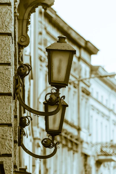 Outdoor Wall Lamp with building in background