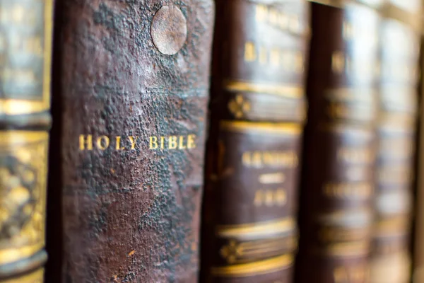 Old books spines holy bible — Stock Photo, Image