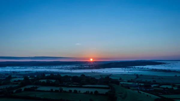 Napkelte megtekintése Glastonbury Tor b, Somerset, Anglia — Stock Fotó