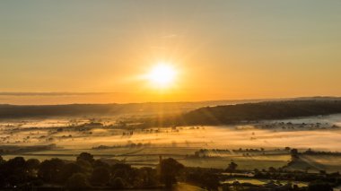 Sunrise görünümü Glastonbury Tor c, Somerset, İngiltere