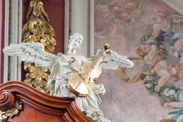 Sculpture on top of the altar - baroque parish and collegiate ch — Stock Photo, Image