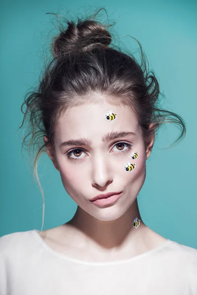 Funny make-up professional style for yong fashion model. Sticker on face. — Stock Photo, Image