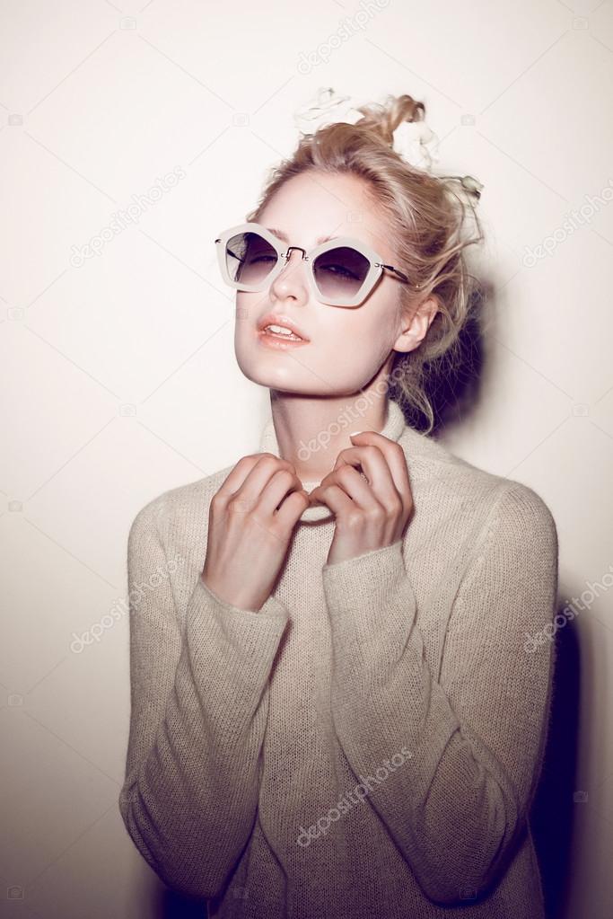 fashion woman portrait. Sunglasses Hippie hair flowers on face