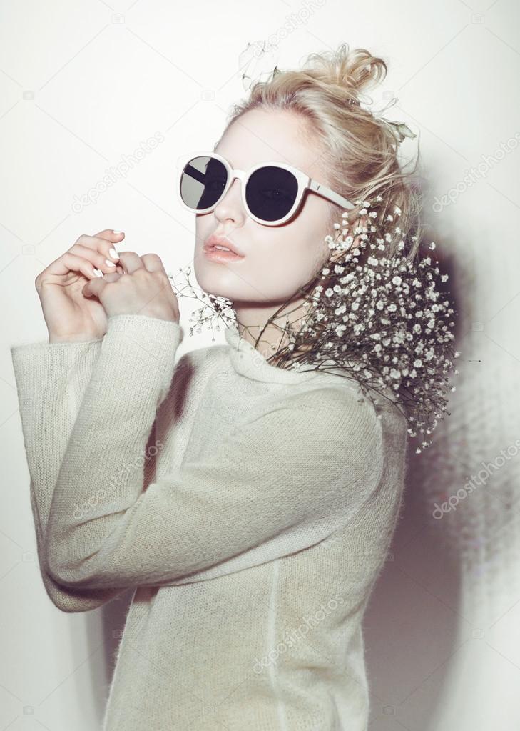 fashion woman portrait. Sunglasses Hippi hair flowers on face