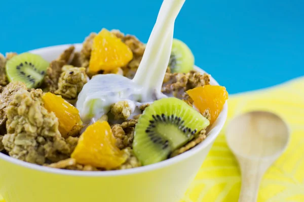 Milk pouring into cereals — Stock Photo, Image