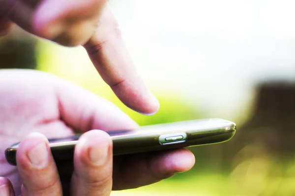 Man hands holding smartphone — Stock Photo, Image