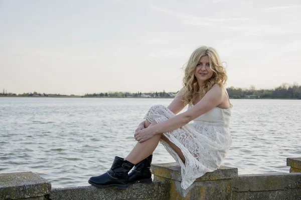 Blond woman in white lace dress — Stock Photo, Image