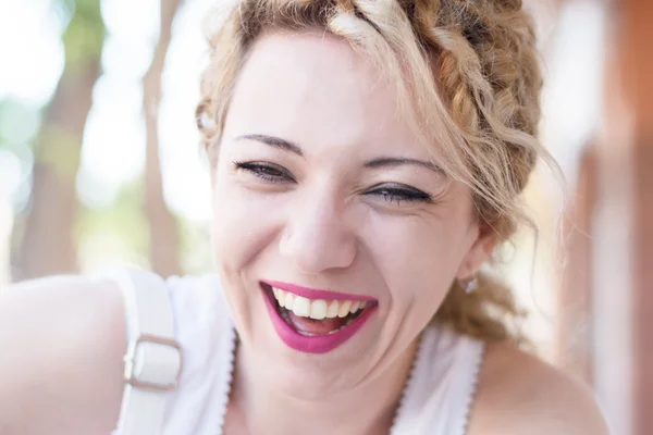 Cute curly blond girl — Stock Photo, Image