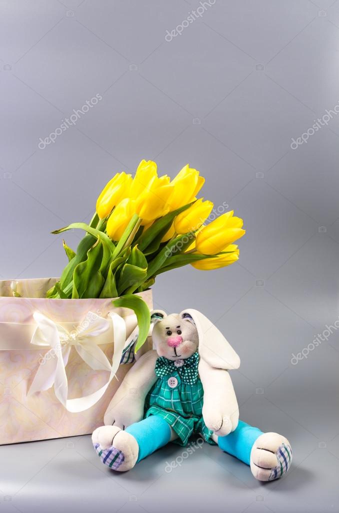 yellow and gray gift bags