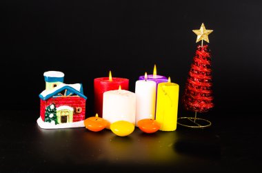 Noel fener şeklinde mum içinde ile küçük ev