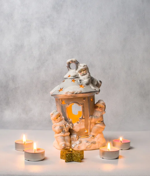 Candlestick and small candles — Stock Photo, Image