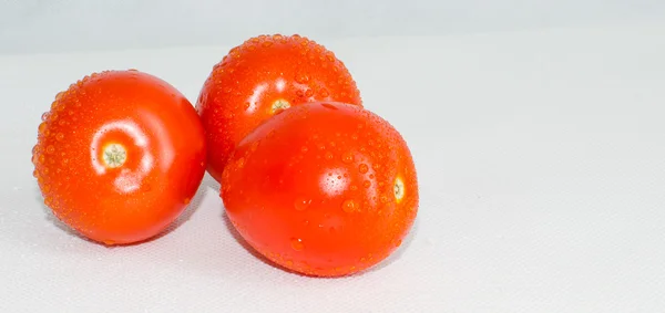 Closeup of juicy tomatoes with drops juicy tomatoes with drops — Stock Photo, Image