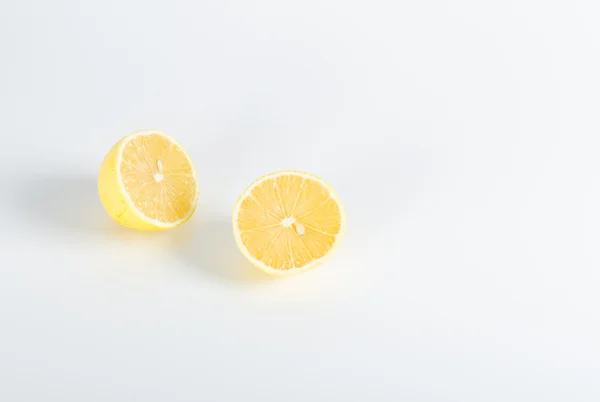 Juicy half of lemon isolated on white — Stock Photo, Image