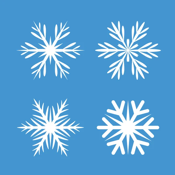 Συλλογή από λευκά νιφάδες χιονιού και μπλε φόντο. — Διανυσματικό Αρχείο
