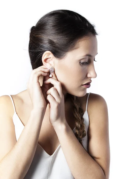 Close up of beautiful woman wearing shiny earrings — Stock Photo, Image