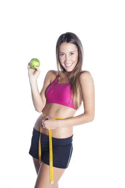 Beautiful young healthy woman with measure tape and apple. Diet Stock Picture