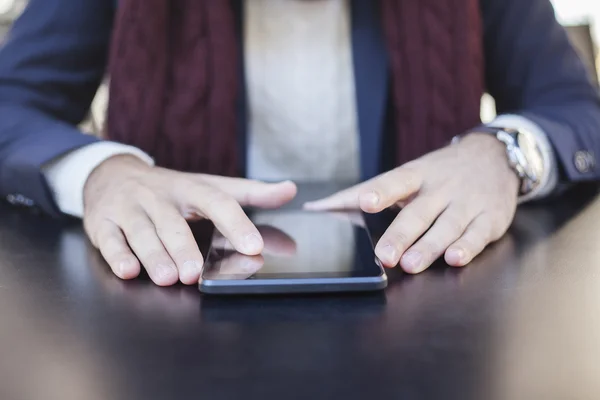 Man with tablet computer reading some news. - Stock Image - Everypixel