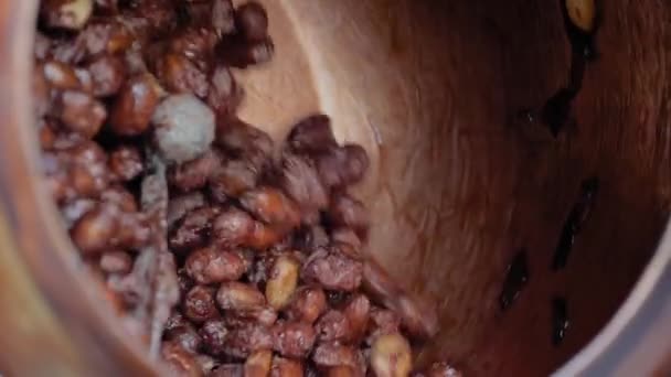Slow motion: nut roaster machine for mixing, roasting and glazing peanuts — Stock Video